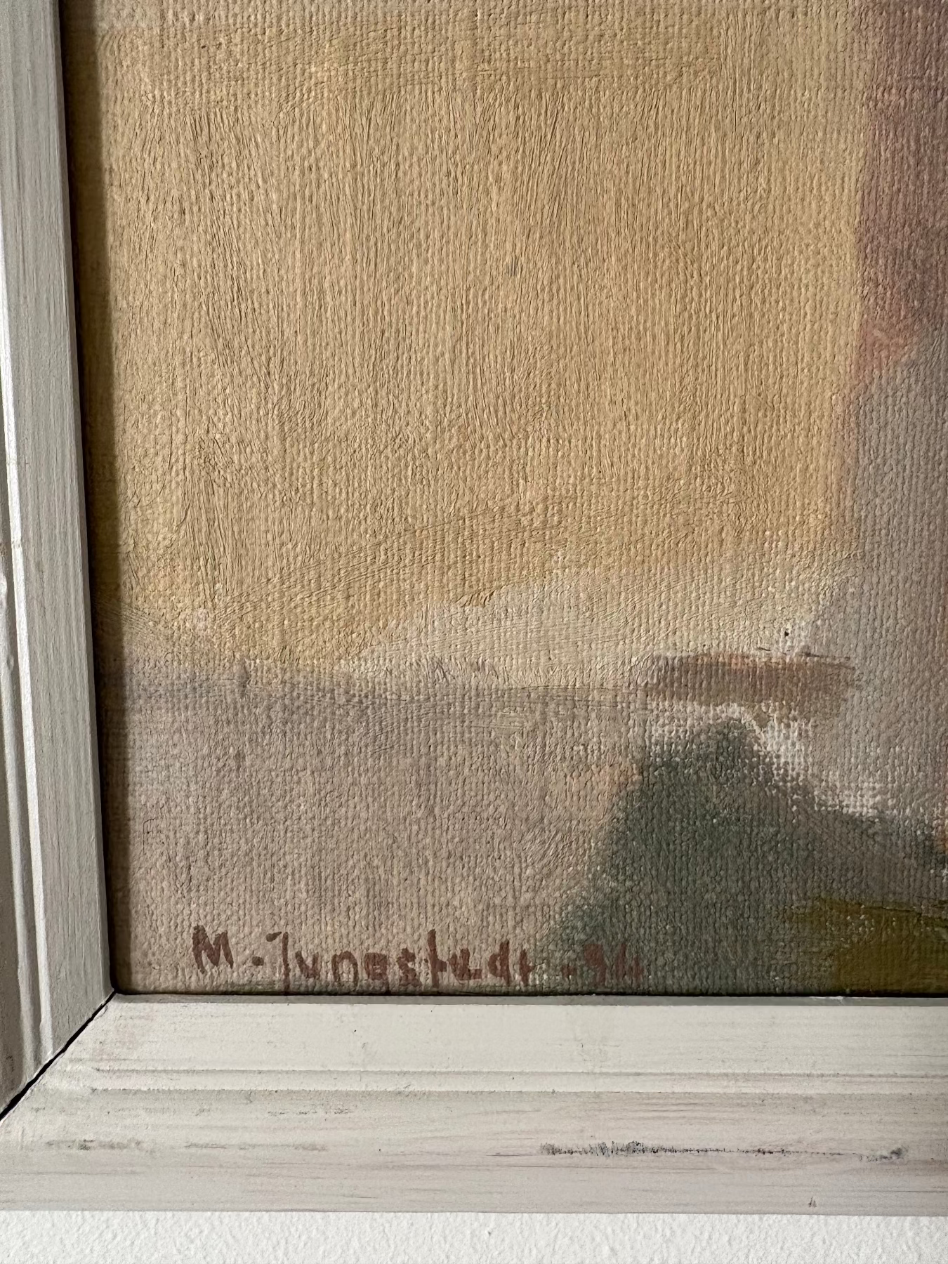 Detail from City Walls, oil painting by Matts Jungstedt, showing signature and frame.